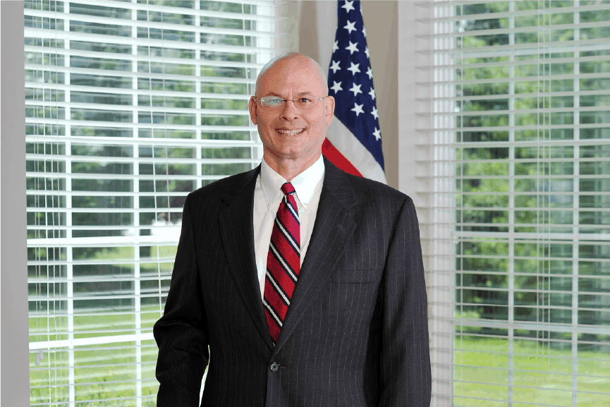 tom dunn in suit and tie