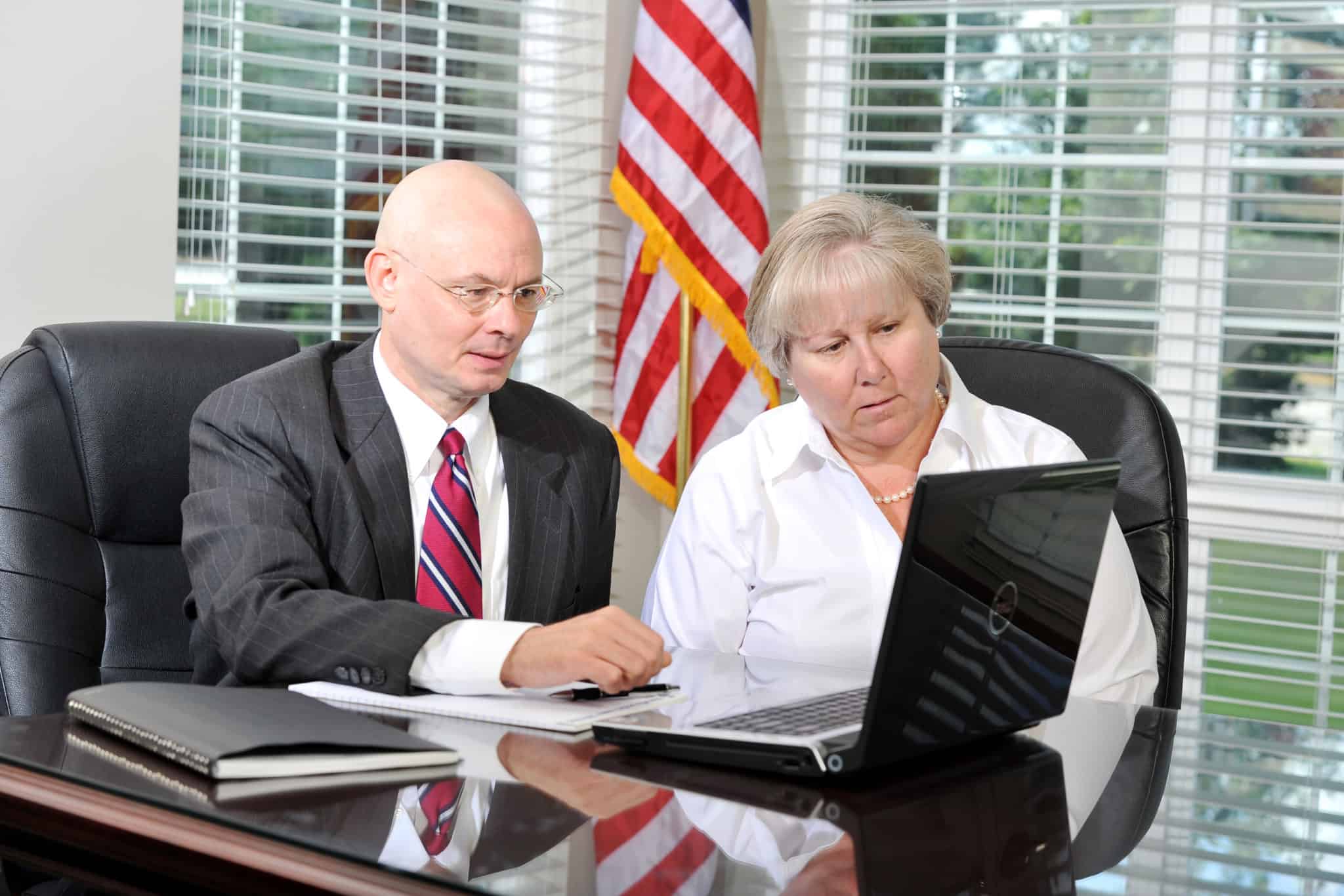 tom dunn on laptop with woman