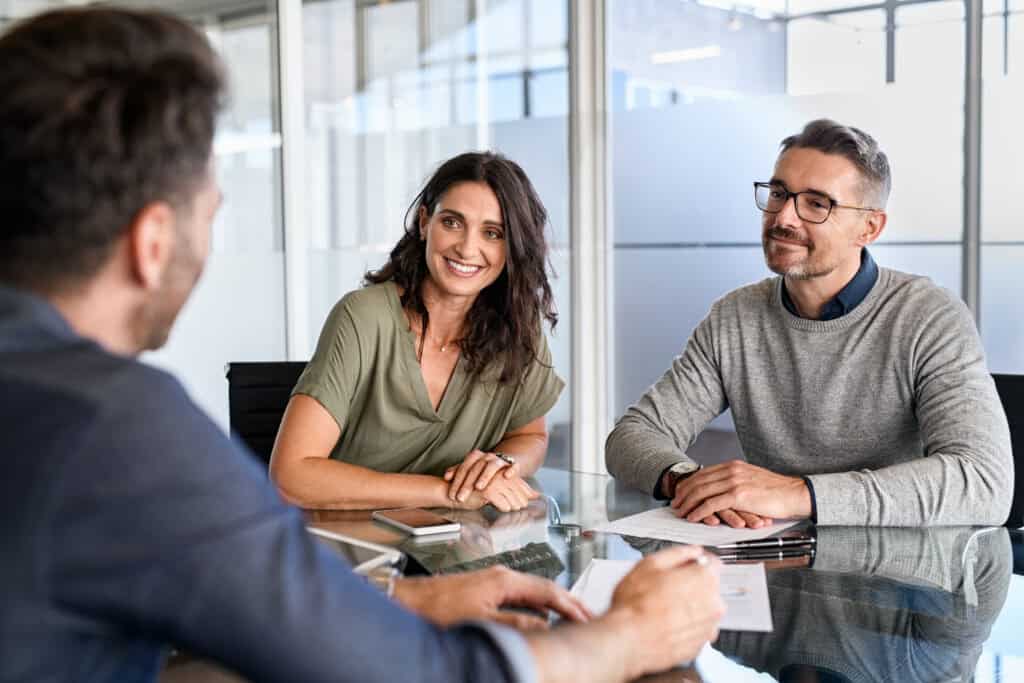 Business meeting with three participants.